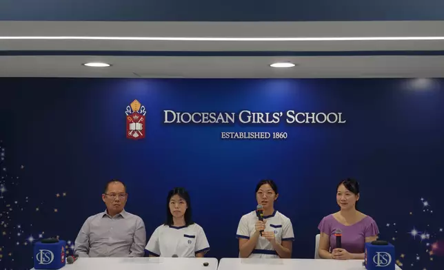 Law Yi Ting (seoncd from the left) and Helen Ching (second from the right) with their families, Photo by Bastille Post
