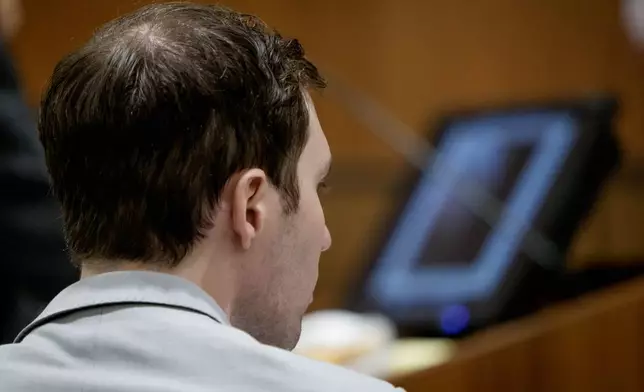 Tyler Robinson, who is accused in the fatal shooting of Charlie Kirk, watches a computer screen during testimony about comparison testing of bullets during a preliminary hearing at the Fourth District Courthouse in Provo, Utah, Thursday, July 9, 2026. (AP Photo/Spenser Heaps, Pool)