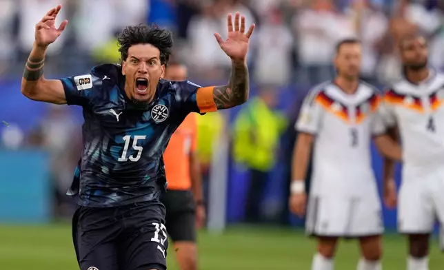 Paraguay's Gustavo Gomez celebrates after winning the World Cup round of 32 soccer match between Germany and Paraguay in Foxborough, Mass., near Boston, Monday, June 29, 2026. (AP Photo/Charles Krupa)