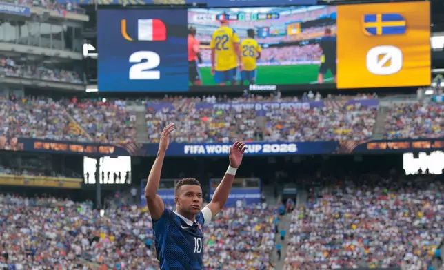 France's Kylian Mbappe (10) gestures during the World Cup round of 32 soccer match between France and Sweden in East Rutherford, N.J., near New York, Tuesday, June 30, 2026. (AP Photo/Pamela Smith)