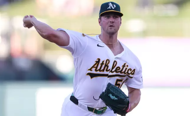Athletics pitcher Jack Perkins throws to a Boston Red Sox batter during the first inning of a baseball game Monday, July 27, 2026, in West Sacramento, Calif. (AP Photo/Scott Marshall)