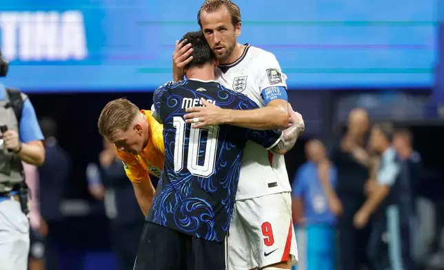 Argentina's Lionel Messi (10) and England's Harry Kane (9) embrace after the World Cup semifinal soccer match between England and Argentina in Atlanta, Wednesday, July 15, 2026. (AP Photo/Erik S. Lesser)
