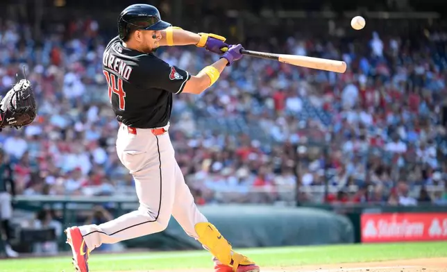 Arizona Diamondbacks' Gabriel Moreno hits a single during the third inning of a baseball game against the Washington Nationals, Saturday, July 25, 2026, in Washington. (AP Photo/Nick Wass)