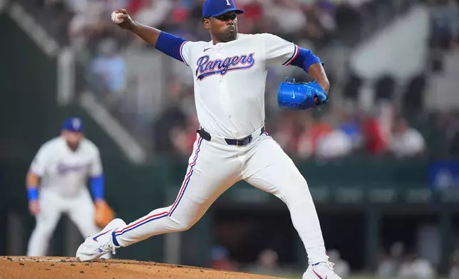 Texas Rangers starting pitcher Kumar Rocker throws during the first inning of a baseball game against the Houston Astros, Saturday, July 11, 2026, in Arlington, Texas. (AP Photo/LM Otero)