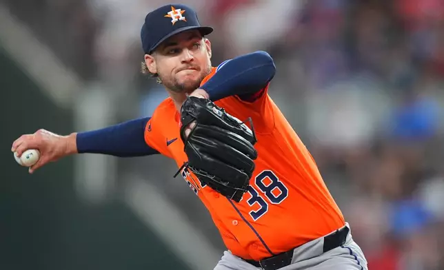 Houston Astros starting pitcher Peter Lambert throws during the first inning of a baseball game against the Texas Rangers, Saturday, July 11, 2026, in Arlington, Texas. (AP Photo/LM Otero)