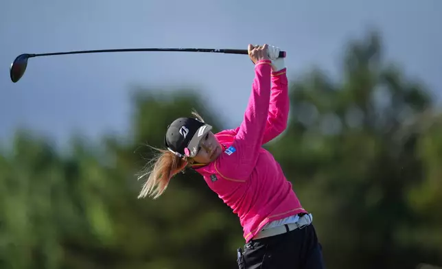 Shiho Kuwaki, of Japan, drives off the 4th tee during the second round of the Women's British Open golf championship in Lytham St Annes, England, Friday, July 31, 2026. (AP Photo/Jon Super)