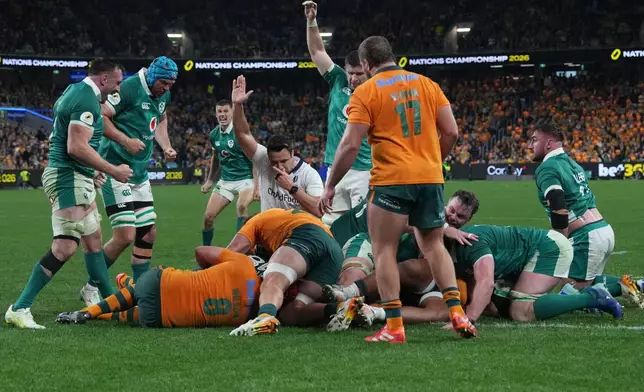 Referee Brian O'Keeffe, indicates that Ireland's Thomas Clarkson score sa try as during the Nations Championship rugby international between Australia and Ireland in Sydney, Saturday July, 4, 2026. (AP Photo/Mark Baker)