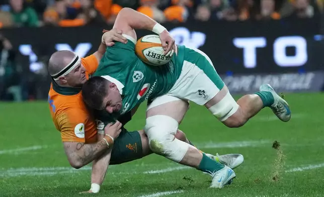 Australia's Dylan Pietsch, brings down Ireland's Nick Timoney during the Nations Championship rugby international between Australia and Ireland in Sydney, Saturday July, 4, 2026. (AP Photo/Mark Baker)