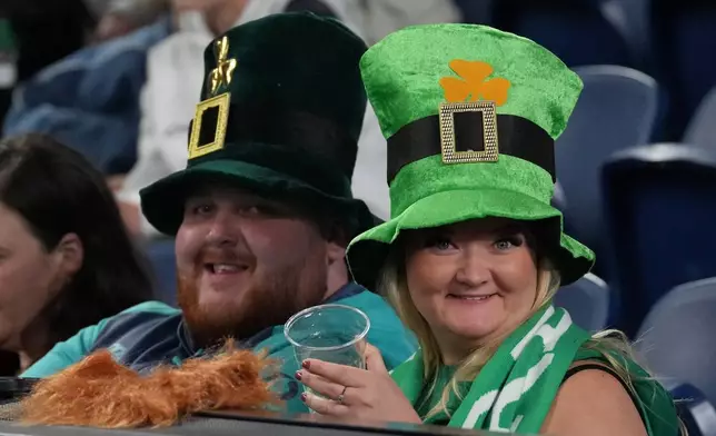 Irish fans pose for the cameras ahead of the Nations Championship rugby international between Australia and Ireland in Sydney, Saturday July, 4, 2026. (AP Photo/Mark Baker)