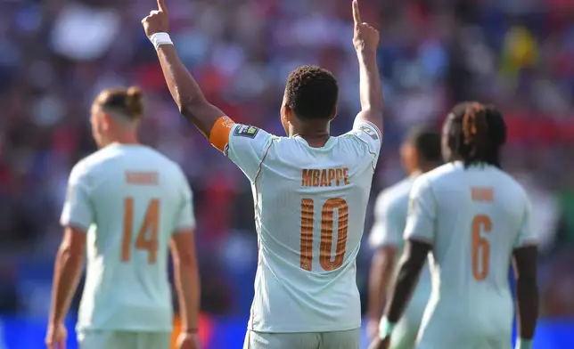 France's Kylian Mbappe (10) celebrates scoring the opening goal during the World Cup quarterfinal soccer match between France and Morocco in Foxborough, Mass., near Boston, Thursday, July 9, 2026. (AP Photo/Steven Senne)