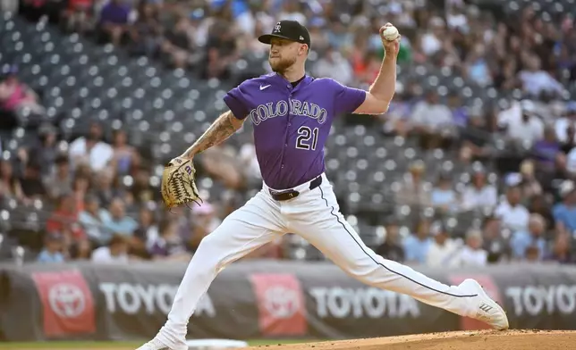 Colorado Rockies starting pitcher Kyle Freeland throws in the first inning of a baseball game against the Miami Marlins Wednesday, July 1, 2026, in Denver. (AP Photo/Geneva Heffernan)