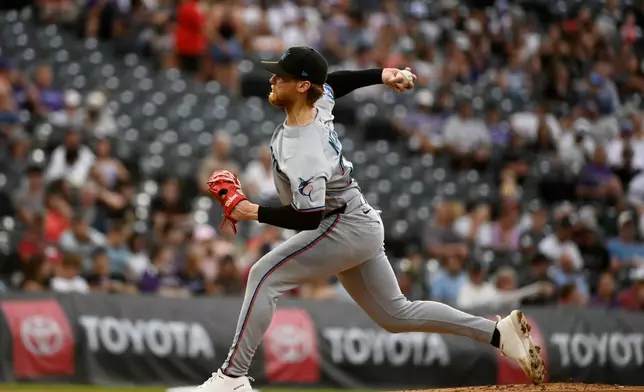 Miami Marlins starting pitcher Max Meyer throws in the first inning of a baseball game against the Colorado Rockies Wednesday, July 1, 2026, in Denver. (AP Photo/Geneva Heffernan)