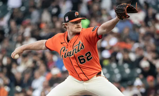 San Francisco Giants pitcher Logan Webb (62) delivers a pitch during the first inning of a MLB baseball game against the Los Angeles Angels in San Francisco, Friday, July 24, 2026. (Stephen Lam/San Francisco Chronicle via AP)