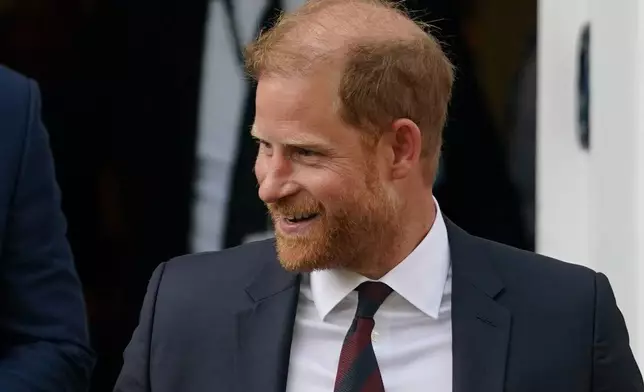 Britain's Prince Harry leaves Chatham House during a visit to the UK for a series of charity engagements in London, Tuesday, July 7, 2026.(AP Photo/Alberto Pezzali)