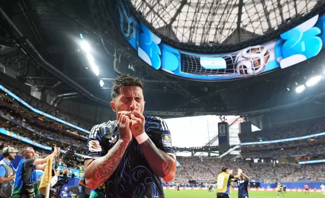Argentina's Enzo Fernandez celebrates after scoring his side's first goal during the World Cup semifinal soccer match between England and Argentina in Atlanta, Wednesday, July 15, 2026. (AP Photo/Rebecca Blackwell)