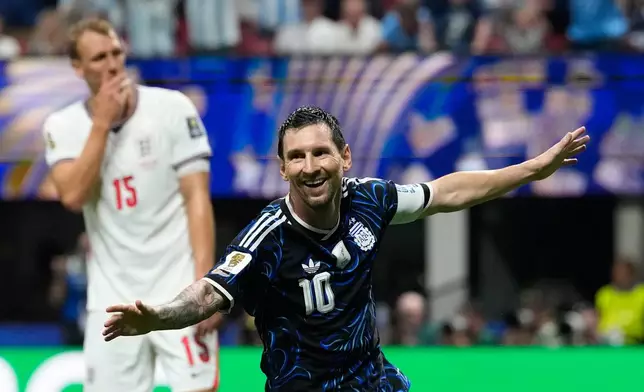 Argentina's Lionel Messi celebrates after teammate Enzo Fernandez scored their side's first goal during the World Cup semifinal soccer match between England and Argentina in Atlanta, Wednesday, July 15, 2026. (AP Photo/Rebecca Blackwell)