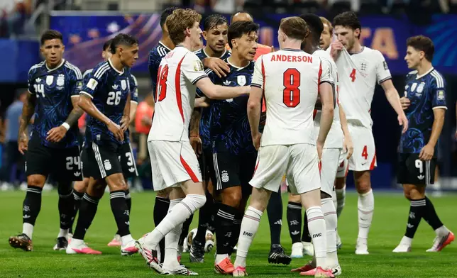 Players argue during the World Cup semifinal soccer match between England and Argentina in Atlanta, Wednesday, July 15, 2026. (AP Photo/Erik S. Lesser)