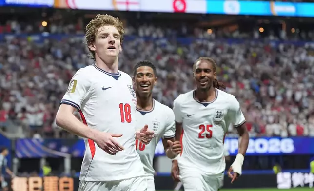 England's Anthony Gordon (18) celebrates after scoring the opening goal during the World Cup semifinal soccer match between England and Argentina in Atlanta, Wednesday, July 15, 2026. (AP Photo/Stephanie Scarbrough)