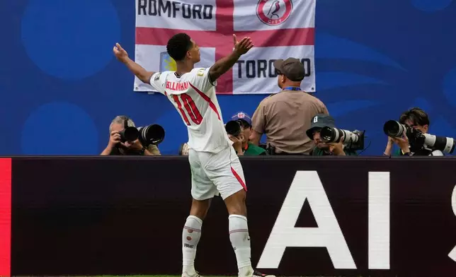 England's Jude Bellingham (10) celebrates scoring his side's 2nd goal during the World Cup quarterfinal soccer match between Norway and England in Miami Gardens, Fla., Saturday, July 11, 2026. (AP Photo/Chris Carlson)