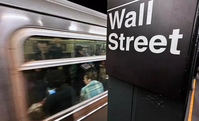 FILE - A train arrives at a Wall Street subway station in New York's Financial District on Nov. 5, 2024. (AP Photo/Peter Morgan, File)