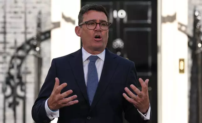Britain's new Prime Minister Andy Burnham speaks to staff and media at 10 Downing Street in London, Monday, July 20, 2026.(AP Photo/Kirsty Wigglesworth)