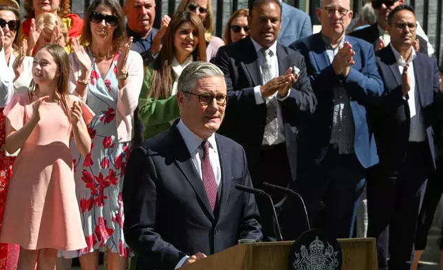 Britain's outgoing Prime Minister Keir Starmer speaks as he leaves 10 Downing Street in London, Monday, July 20, 2026..(AP Photo/Thomas Krych)