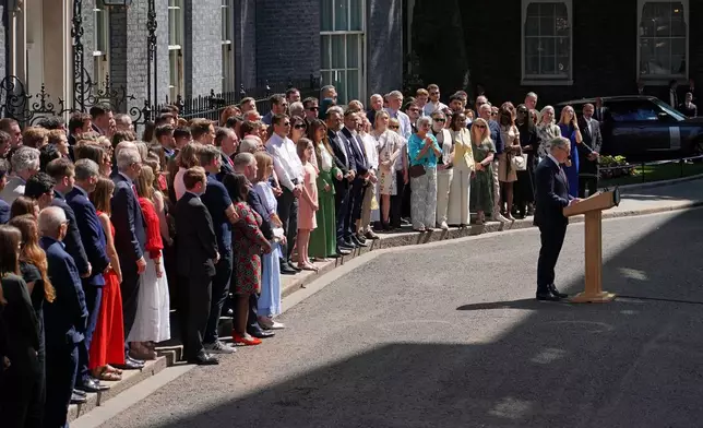 Britain's outgoing Prime Minister Keir Starmer speaks as he leaves 10 Downing Street in London, Monday, July 20, 2026.(AP Photo/Alberto Pezzali)
