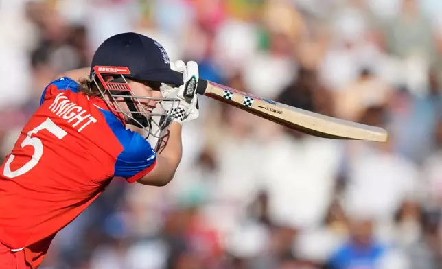 England's Heather Knight plays a shot during the Women's T20 Cricket World Cup semifinal match between England and South Africa in London, Thursday, July 2, 2026. (AP Photo/Alastair Grant)