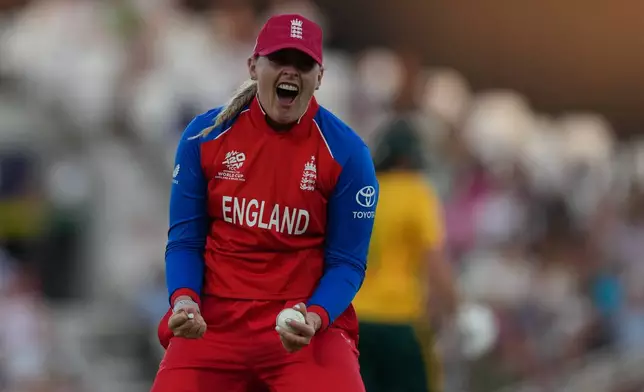 England's Sophie Ecclestone celebrates during the Women's T20 Cricket World Cup semifinal match between England and South Africa in London, Thursday, July 2, 2026. (AP Photo/Alastair Grant)
