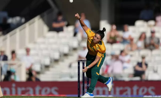 South Africa's Marizanne Kapp bowls during the Women's T20 Cricket World Cup semifinal match between England and South Africa in London, Thursday, July 2, 2026. (AP Photo/Alastair Grant)