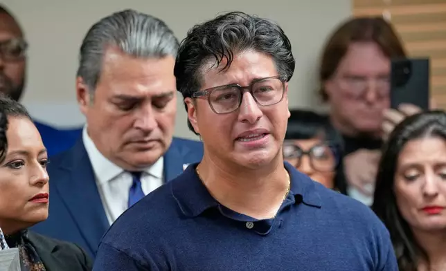 Ronaldo Salgado, son of Lorenzo Salgado Araujo, speaks during a news conference Wednesday, July 8, 2026, in Houston. (AP Photo/David J. Phillip)
