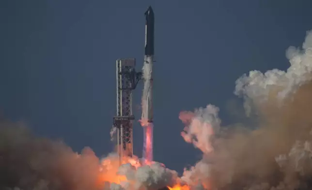 SpaceX's Starship rocket lifts off for a test flight from Starbase, Texas, Friday, July 24, 2026. (AP Photo/Eric Gay)