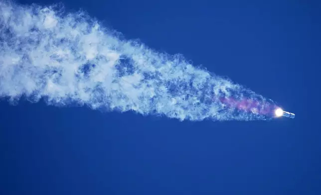SpaceX's mega rocket Starship makes a test flight from Starbase, Texas, Friday, July 24, 2026. (AP Photo/Eric Gay)