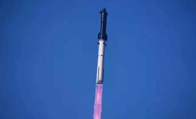 SpaceX's mega rocket Starship makes a test flight from Starbase, Texas, Friday, July 24, 2026. (AP Photo/Eric Gay)