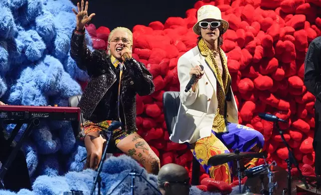 FILE - Paco Amoroso, left, and Ca7riel perform during the 2025 Latin Grammys in Las Vegas on Nov. 13, 2025. (AP Photo/Chris Pizzello, File)