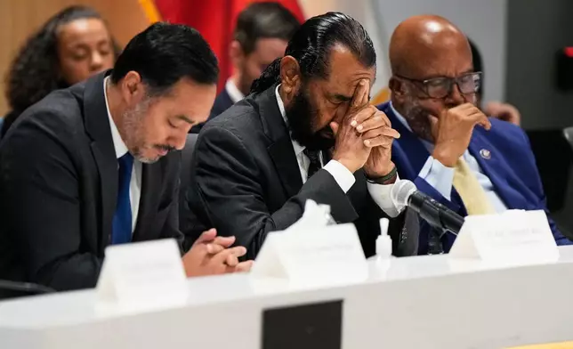 From left, Rep. Joaquin Castro, D-Texas, Rep. Al Green, D-Texas, and Rep. Bennie Thompson, D-Ala. react during an oversight forum on Friday, July 24, 2026, in Houston, about the death of Lorenzo Salgado Araujo, who was shot and killed by an ICE officer. (AP Photo/Ashley Landis)