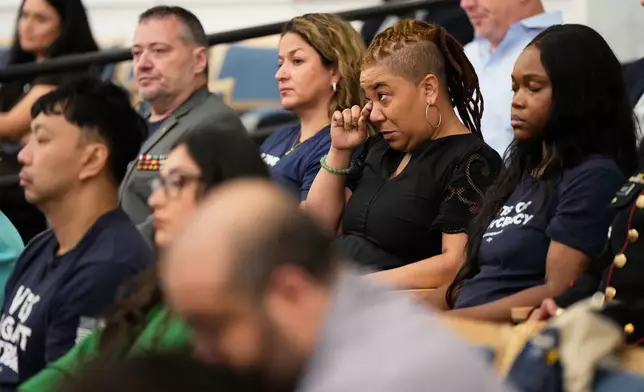 People react during an oversight forum on Friday, July 24, 2026, in Houston, about the death of Lorenzo Salgado Araujo, who was shot and killed by an ICE officer. (AP Photo/Ashley Landis)