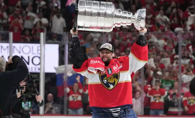 FILE - Florida Panthers goaltender Sergei Bobrovsky lifts the Stanley Cup after defeating the Edmonton Oilers in Game 6 of the NHL hockey Stanley Cup Final June 17, 2025, in Sunrise, Fla. (AP Photo/Lynne Sladky, File)