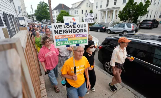Anti-ICE demonstrators march after a man was shot and killed by U.S. Immigration and Customs Enforcement on Monday, July 13, 2026, in Biddeford, Maine. (AP Photo/Robert F. Bukaty)