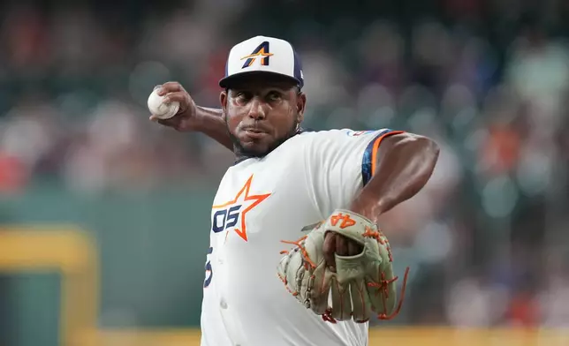 Houston Astros starting pitcher Ronel Blanco delivers to Miami Marlins' Kyle Stowers during the first inning of a baseball game, Monday, July 20, 2026, in Houston. (AP Photo/Karen Warren)