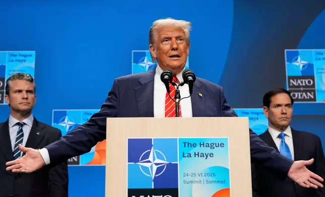 FILE - President Donald Trump speaks during a media conference at the end of the NATO summit as Secretary of State Marco Rubio, right, and Defense Secretary Pete Hegseth listen in The Hague, Netherlands, June 25, 2025. (AP Photo/Alex Brandon, File)