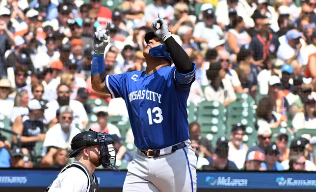 Kansas City Royals designated hitter Salvador Perez reacts after hitting a home run during the seventh inning of a baseball game against the Detroit Tigers, Saturday, July 25, 2026, in Detroit. (AP Photo/Jose Juarez)
