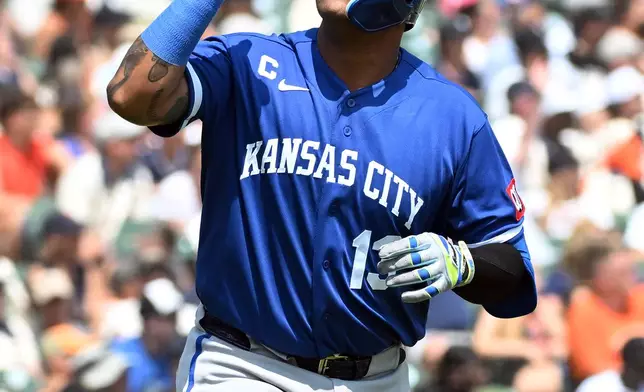 Kansas City Royals designated hitter Salvador Perez reacts after hitting a home run during the seventh inning of a baseball game against the Detroit Tigers, Saturday, July 25, 2026, in Detroit. (AP Photo/Jose Juarez)