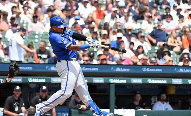 Kansas City Royals designated hitter Salvador Perez hits a home run during the seventh inning of a baseball game against the Detroit Tigers, Saturday, July 25, 2026, in Detroit. (AP Photo/Jose Juarez)