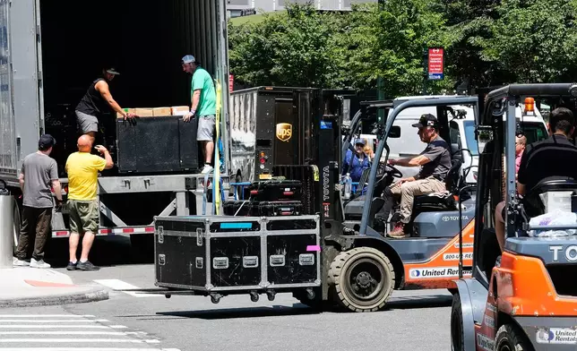 A truck is unloaded outside New York's Madison Square Garden, Wednesday, July 1, 2026. (AP Photo/Richard Drew)