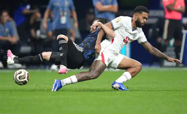 England's Reece James (24) battles for the ball with Argentina's Nicolas Tagliafico (3) during the World Cup semifinal soccer match between England and Argentina in Atlanta, Wednesday, July 15, 2026. (AP Photo/Jacob Kupferman)