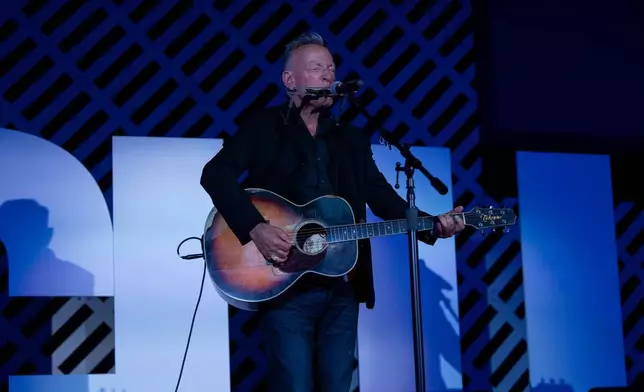 Bruce Springsteen performs on stage after recieving the ACLU Ralph Ellison Award for Defenders of Civil Rights and Civil Liberties in the Arts, Business, Science, and Sports at the ACLU's 2026 Biennial Leadership Conference,Friday, July 24, 2026, in Washington. (AP Photo/Kevin Wolf)
