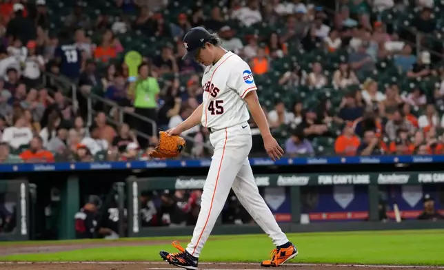 Houston Astros starting pitcher Tatsuya Imai walks toward the dugout after being pulled during the second inning of a baseball game against the Minnesota Twins Wednesday, July 1, 2026, in Houston. (AP Photo/David J. Phillip)