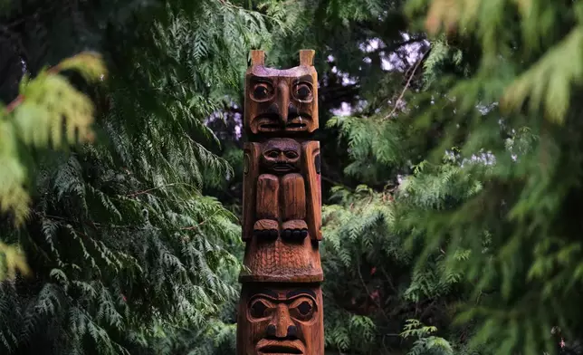A story pole is seen in the middle of a sacred circle at the center of campus at Chief Leschi Schools, which has improved its graduation rates with a career and technical education program, Wednesday, March 18, 2026, in Puyallup, Wash. (AP Photo/Lindsey Wasson)