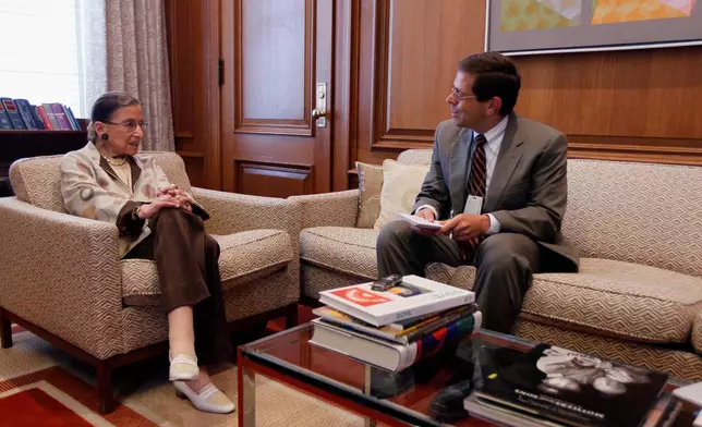 FILE - Supreme Court Justice Ruth Bader Ginsburg is interviewed by Associated Press writer Mark Sherman in her chambers in Washington, Aug. 3, 2010. (AP Photo/Alex Brandon, File)